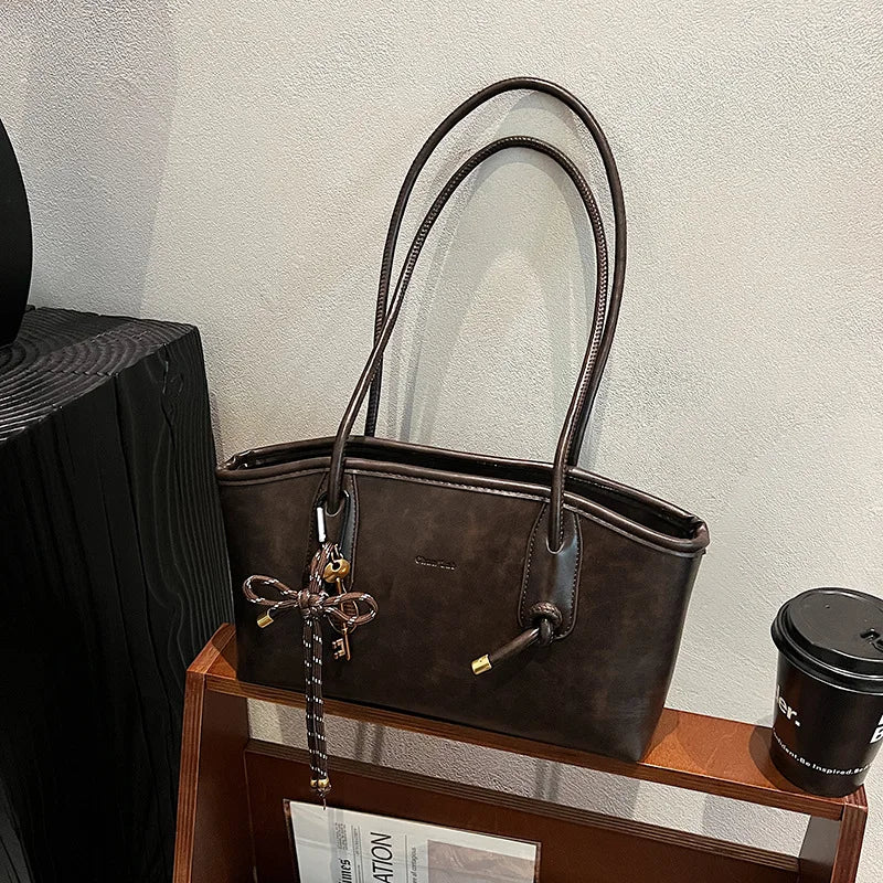 תיק דגם כרמלי