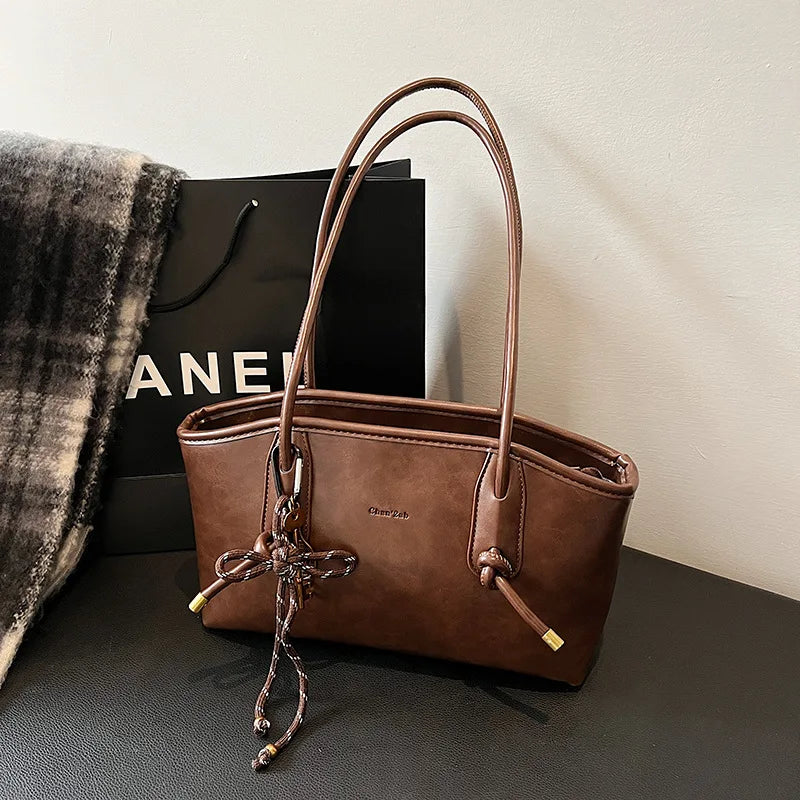 תיק דגם כרמלי